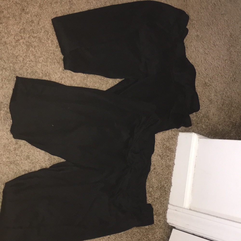 2 pairs of RUE 21 black leggings